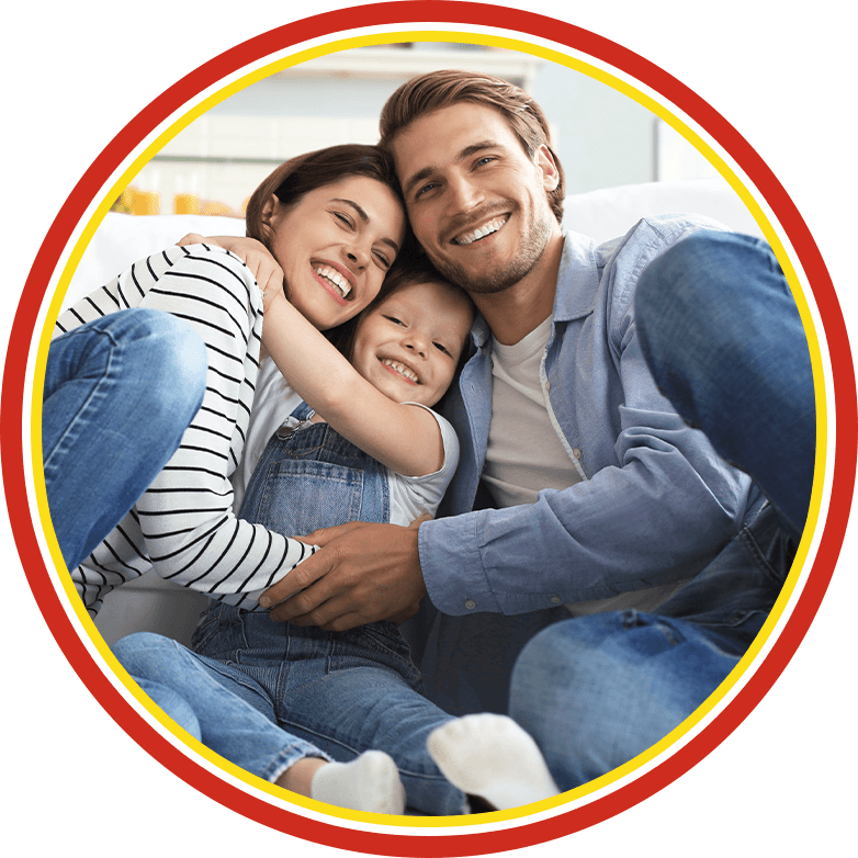 Smiling family of three sitting together in a circular frame.